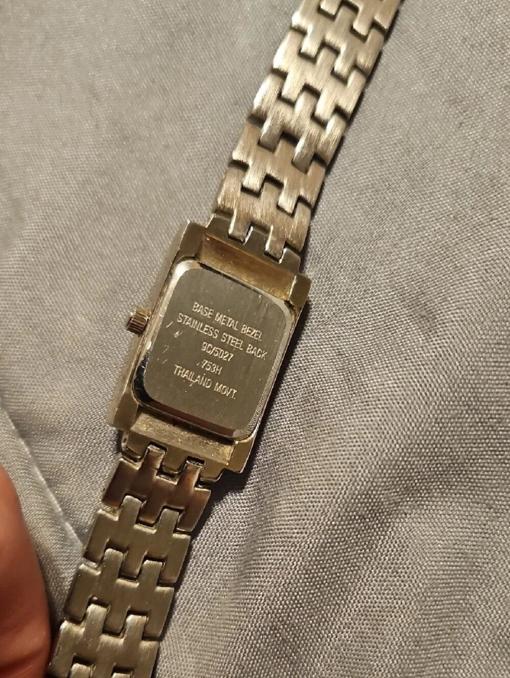 Nine & Co. Women's Silver Tone Bracelet Watch with Black Dial